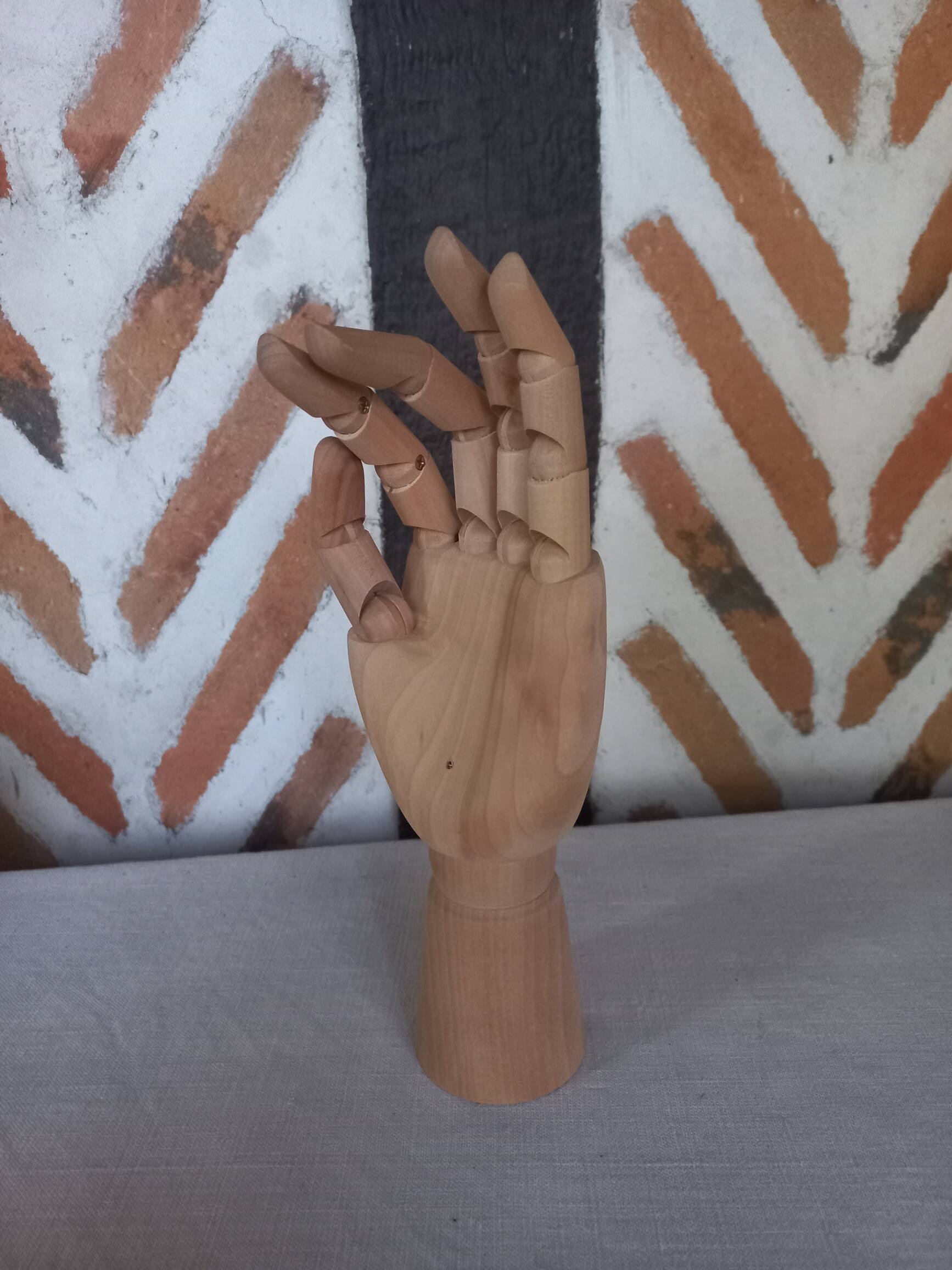 Articulated wooden hand jewelry