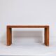 Pair of cognac suede side tables in the style of Jean Michel Frank.