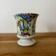 Adorable small porcelain vase from Paris with floral decoration.