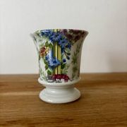 Adorable small porcelain vase from Paris with floral decoration.