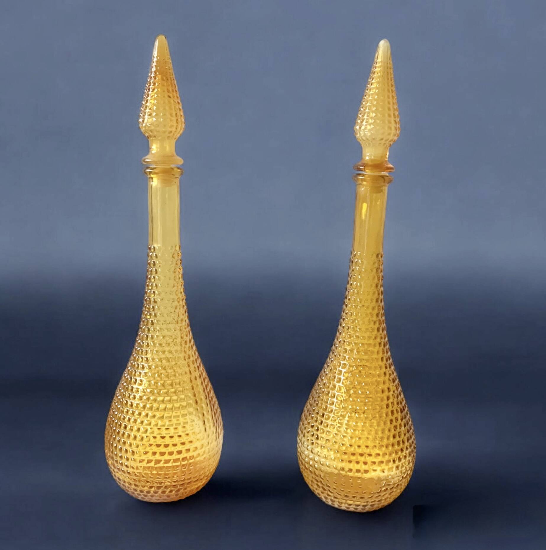 Pair of vintage amber yellow Empoli glass decanters