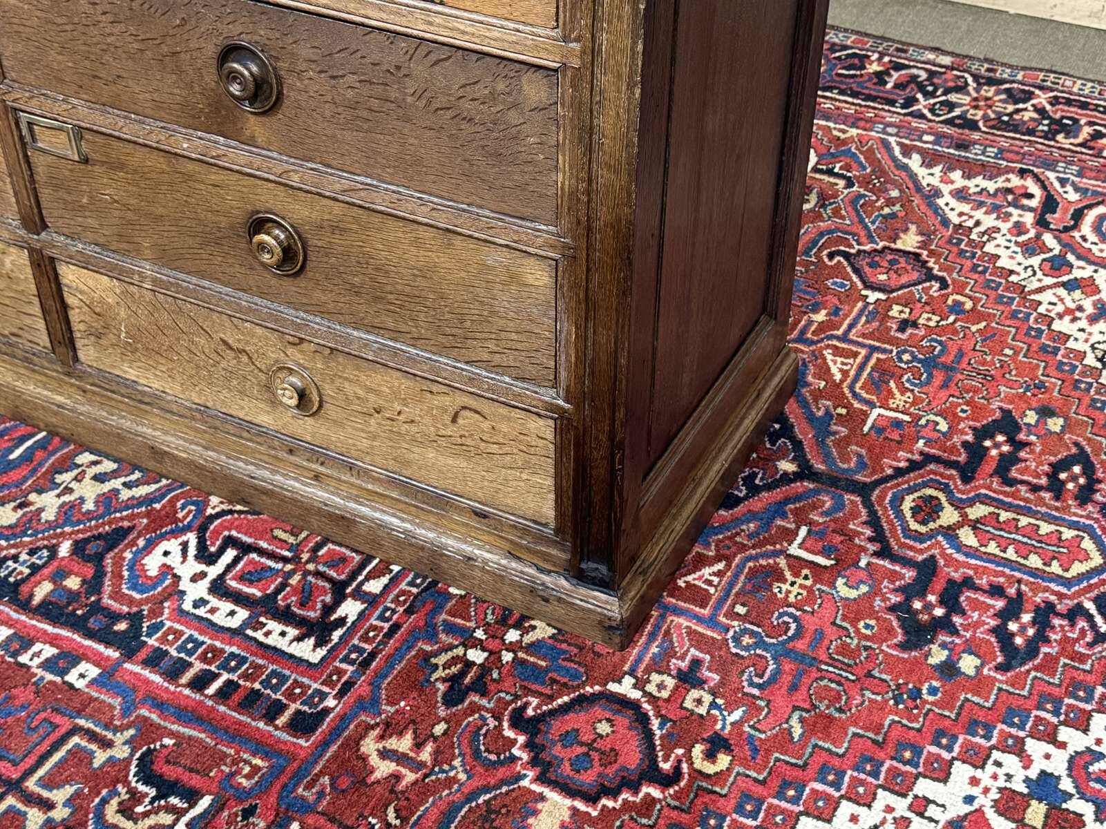 Notary's cabinet with 18 drawers in oak and fir from the early 20th century.