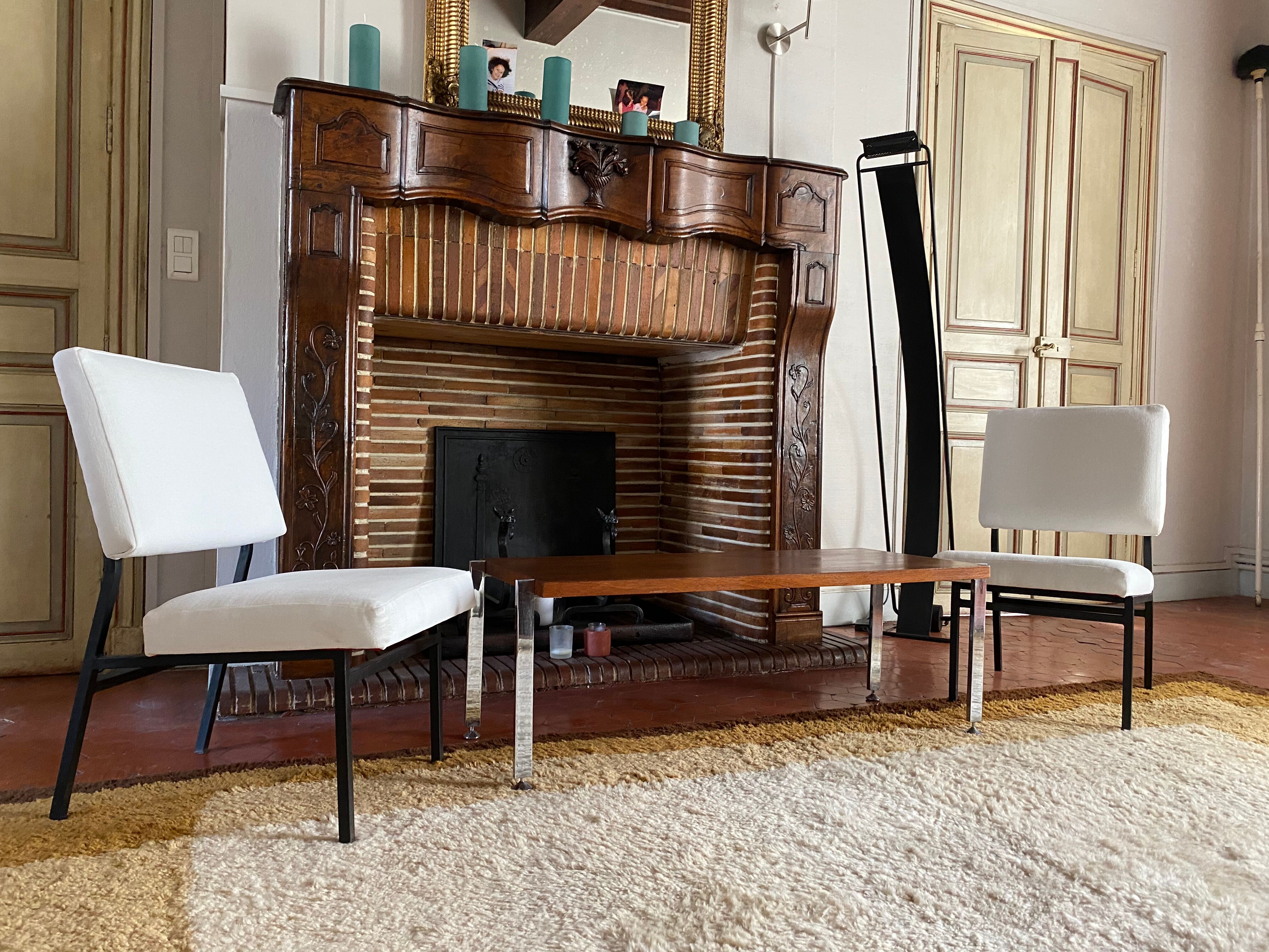 Pair of Paul Geoffroy designer armchairs published by Airborne