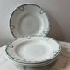 Set of 4 deep plates from Saint Amand with laurel wreath decoration.