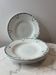 Set of 4 deep plates from Saint Amand with laurel wreath decoration.