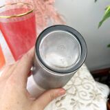 6 colorful juice glasses in their vintage basket