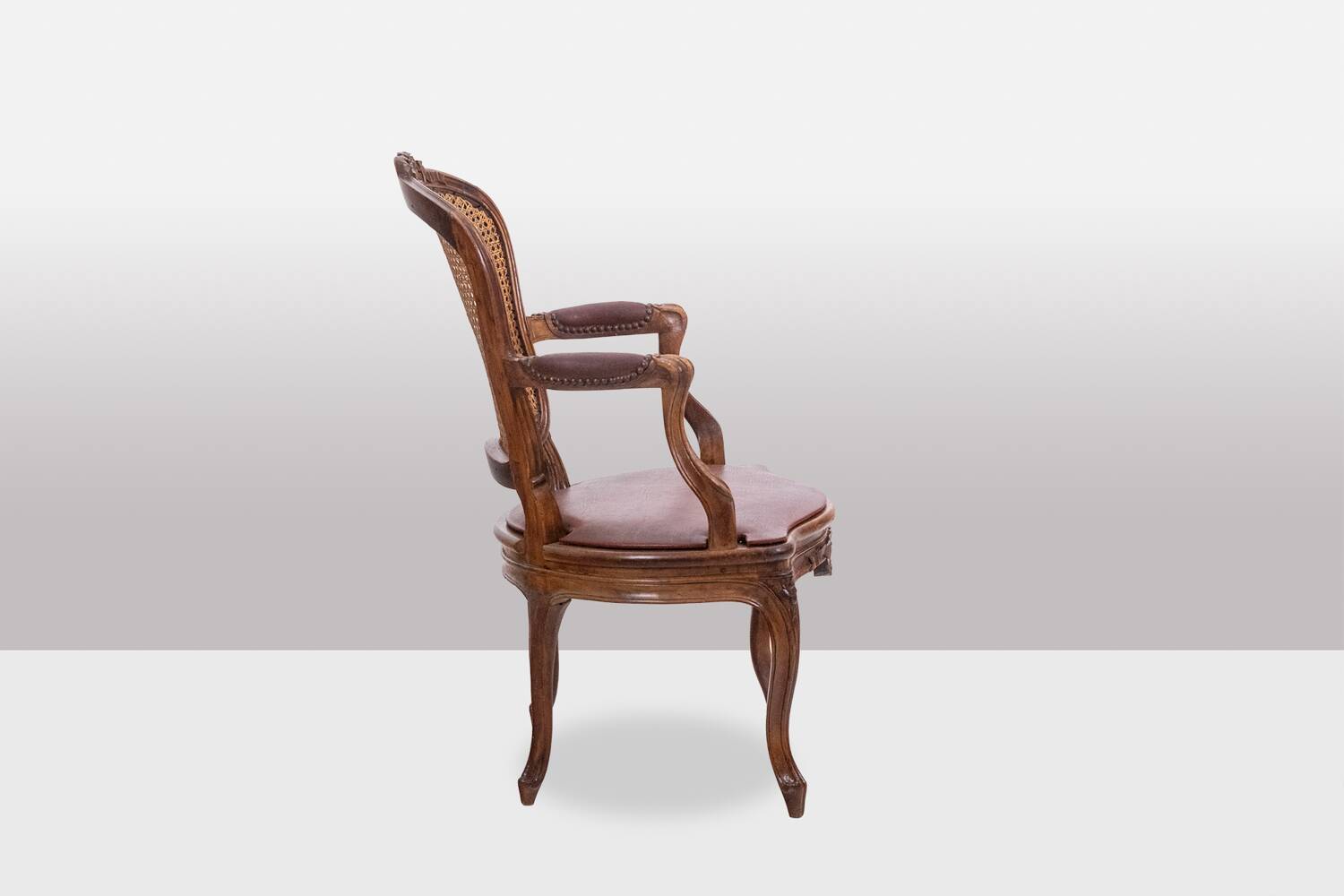 Pair of “cabriolet” armchairs in walnut and canework. Louis XV period. LS5209325