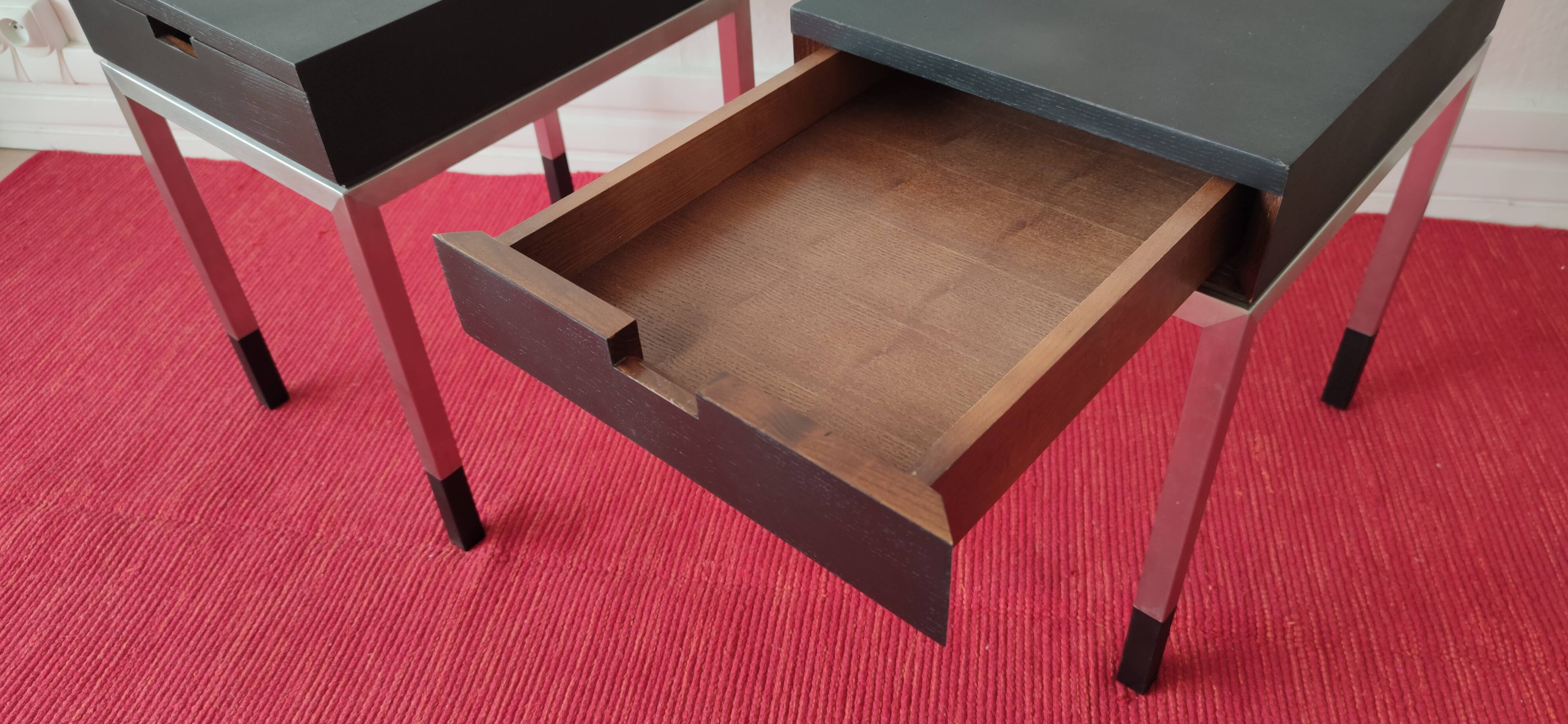 A pair of minimalist bedside tables