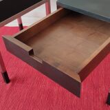 A pair of minimalist bedside tables