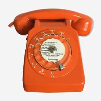 Téléphone à cadran vintage orange