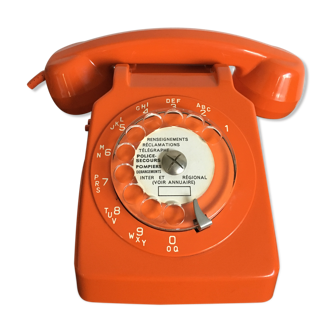 Orange vintage dial phone