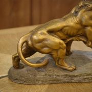 Sculpture of a lion in patinated terracotta by A. Fagotto, 1930s.