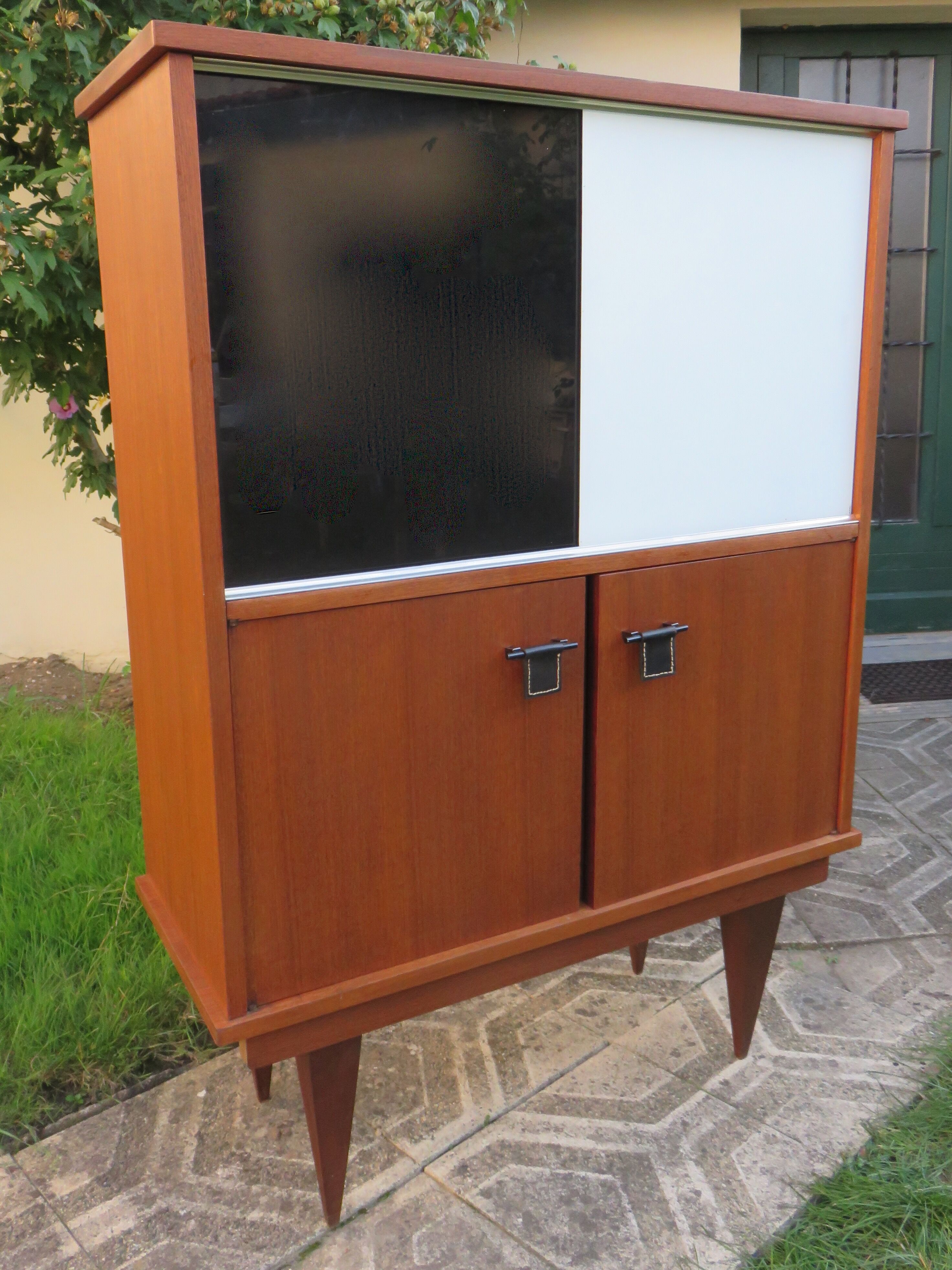 Vintage sideboard with black and white glass doors with cupboard, modernist style, France 1955