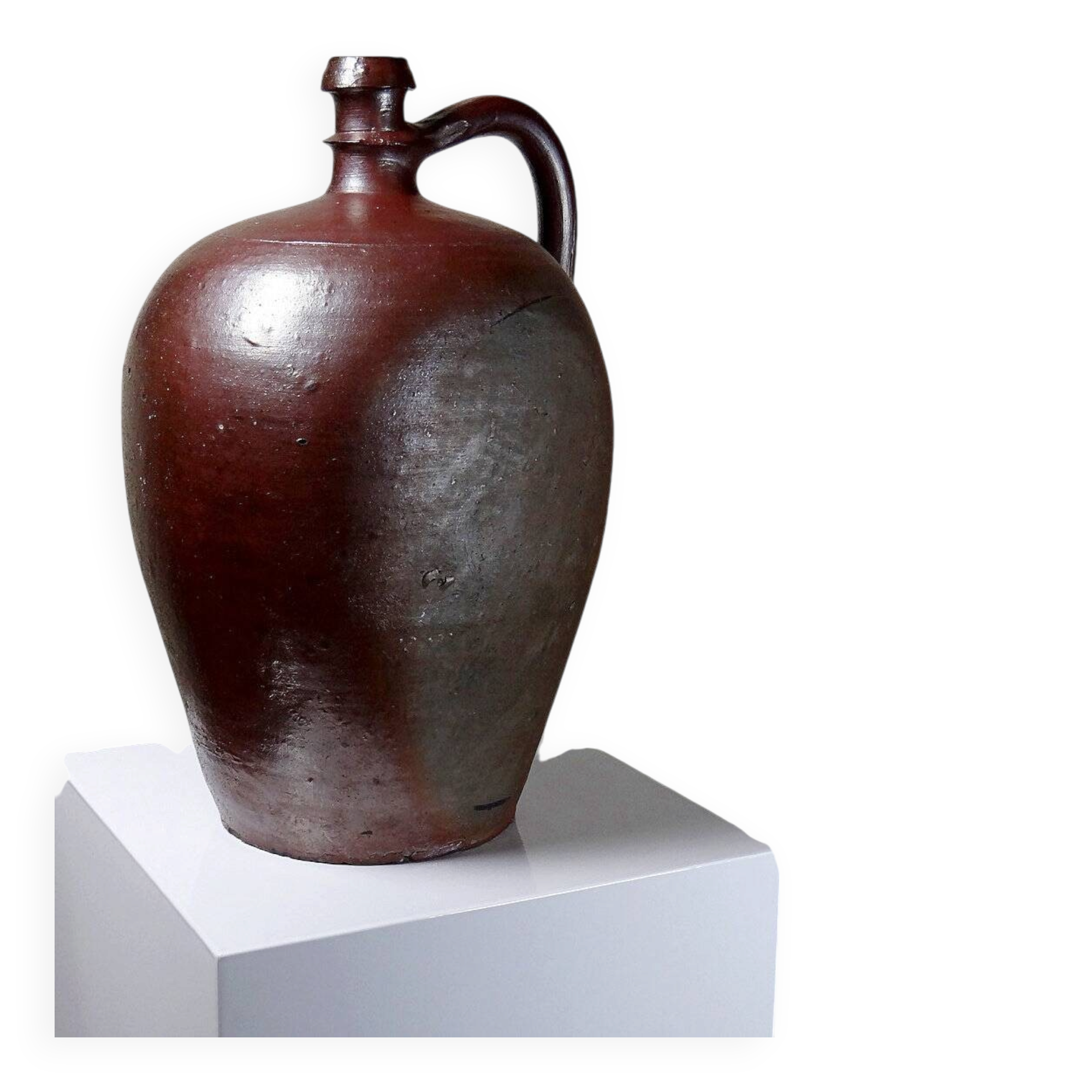 Large stoneware jar with lustrous Bordeaux glaze, antique from the 1920s-30s.