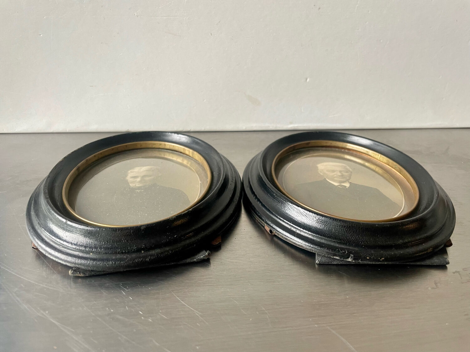 Antique pair of black wooden oval frames each 16.5 cm x 13 cm