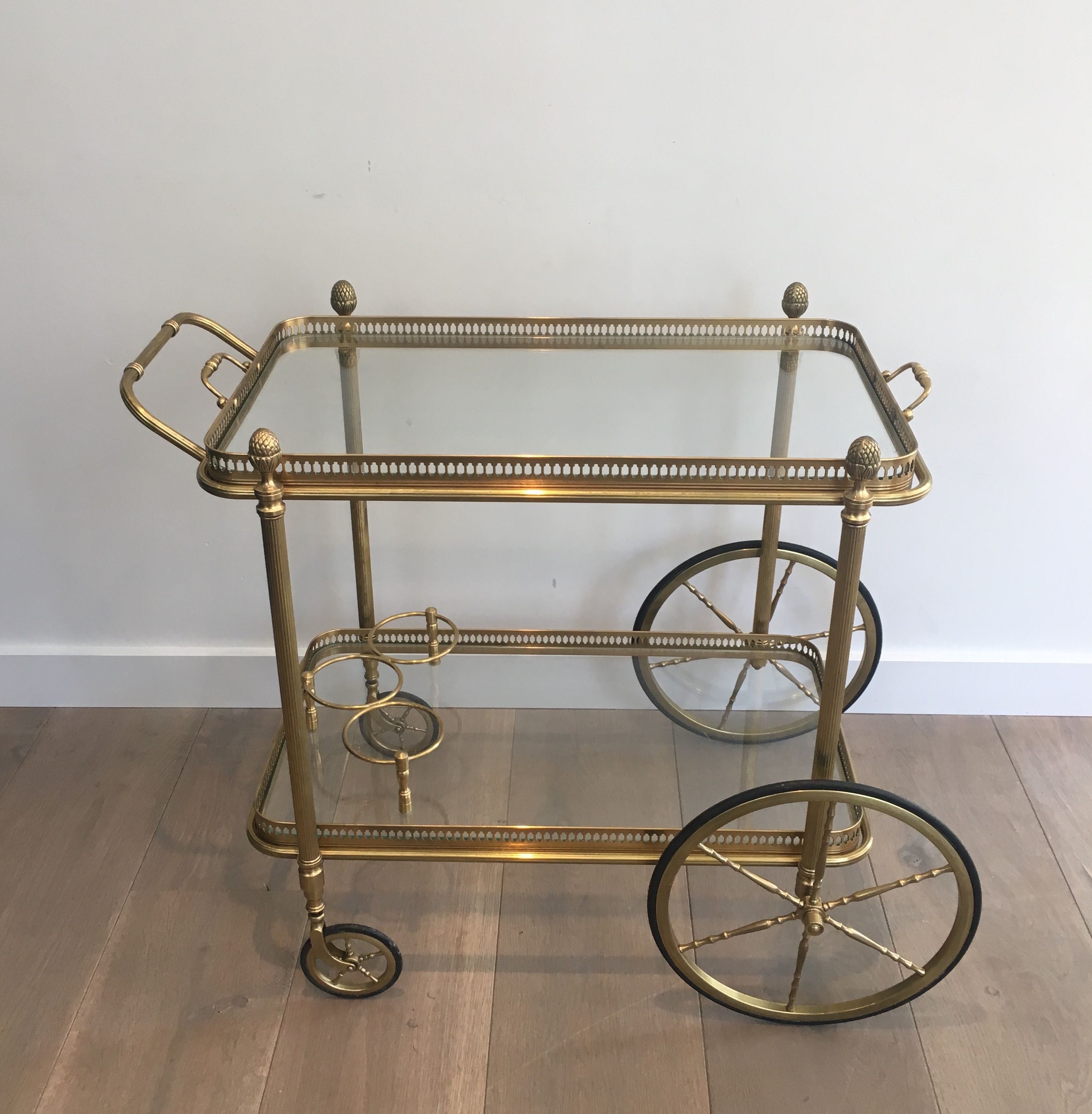 Neoclassical brass rolling table from Maison Baguès