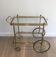 Neoclassical brass rolling table from Maison Baguès