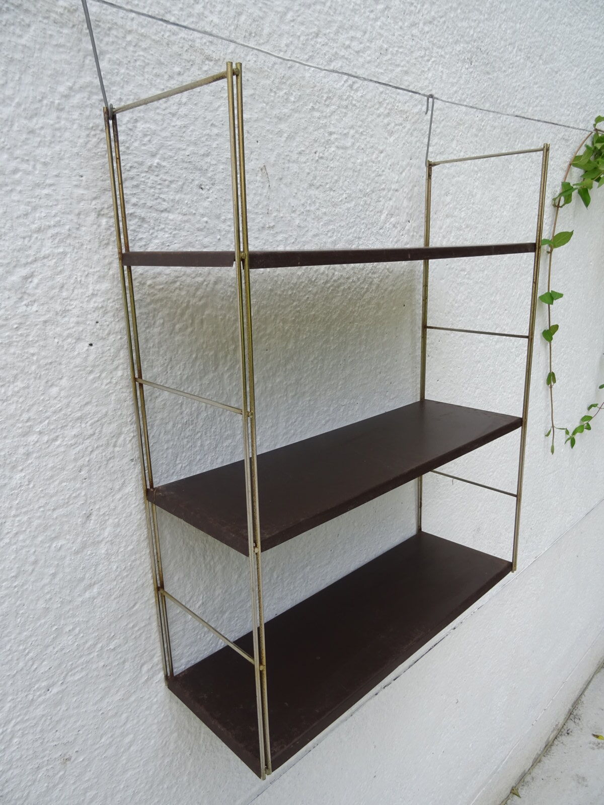 Metal string modular wall shelf