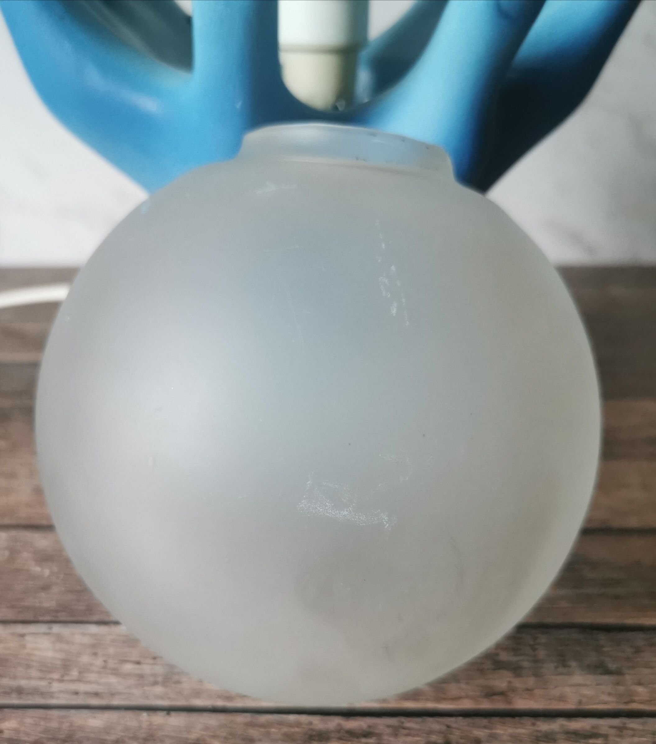 Blue ceramic hand lamp