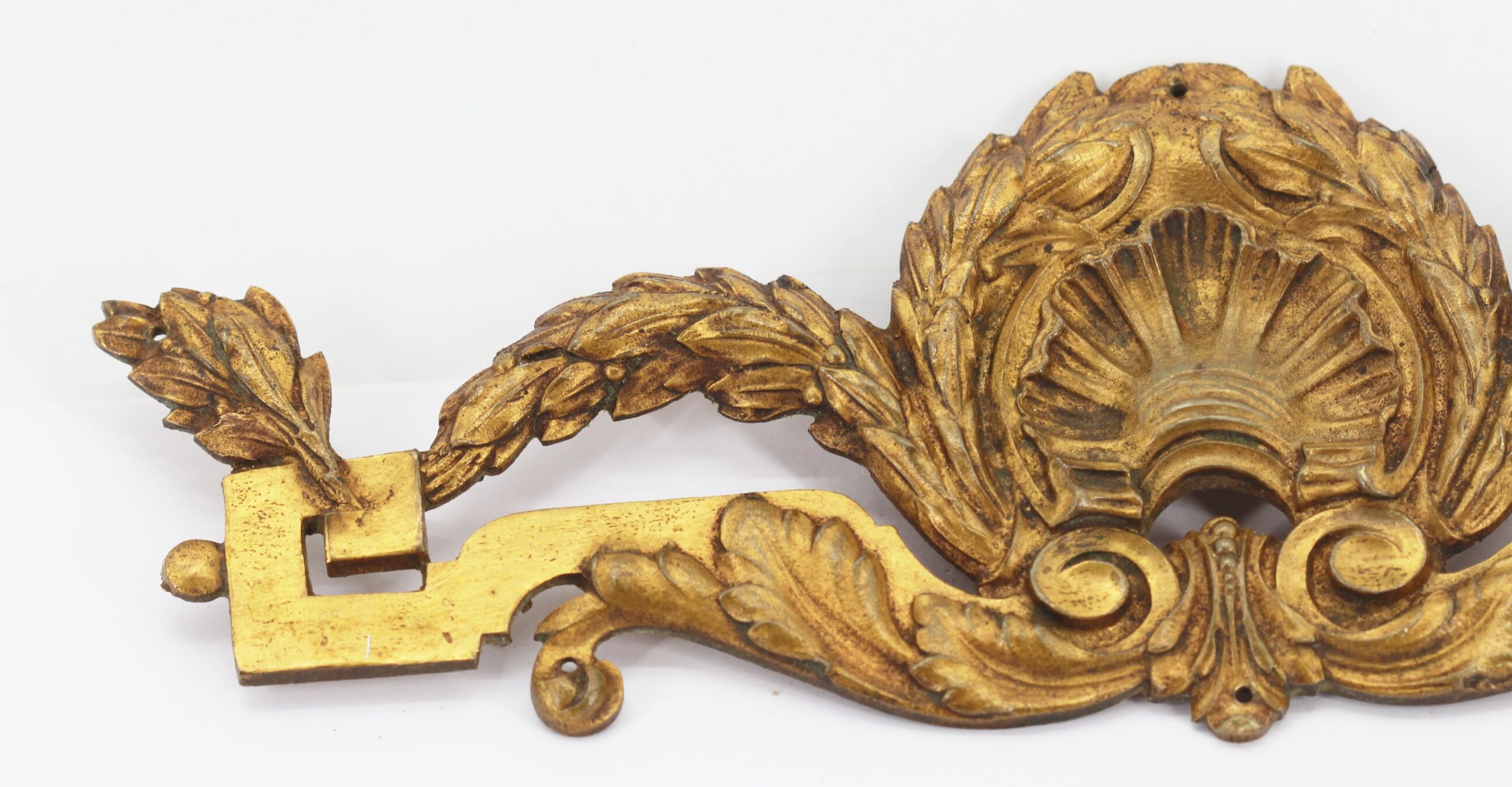 Old brass pediment
