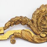 Old brass pediment