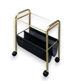 Magazine rack, saddle on vintage wheels