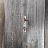 Old door with vintage wooden shutters