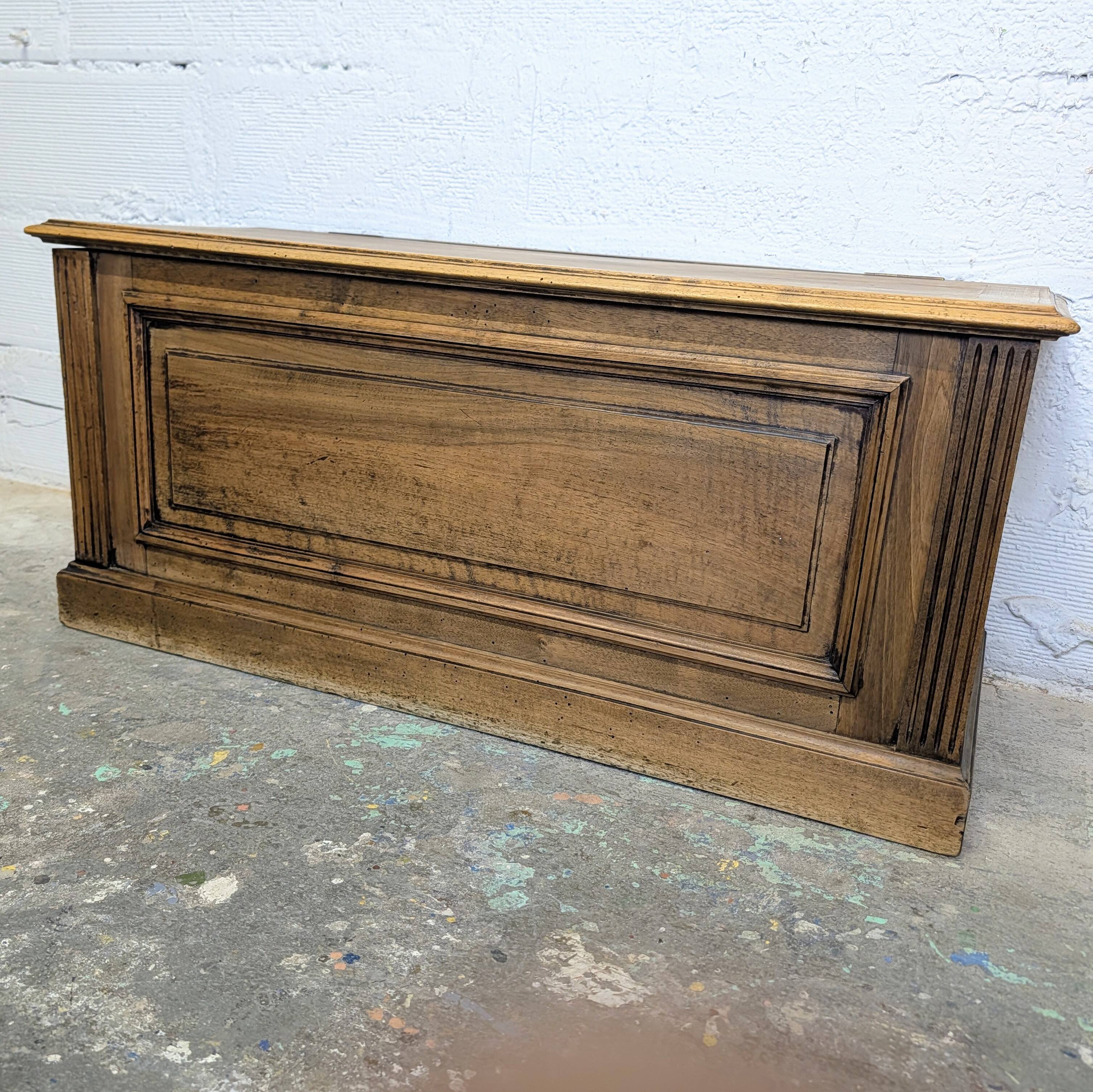 Antique wooden chest with moulded panels