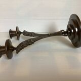 Candle holders in the shape of art deco butterfly wings