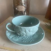 Set of 4 soup / consommé cups and saucers in ceramic.