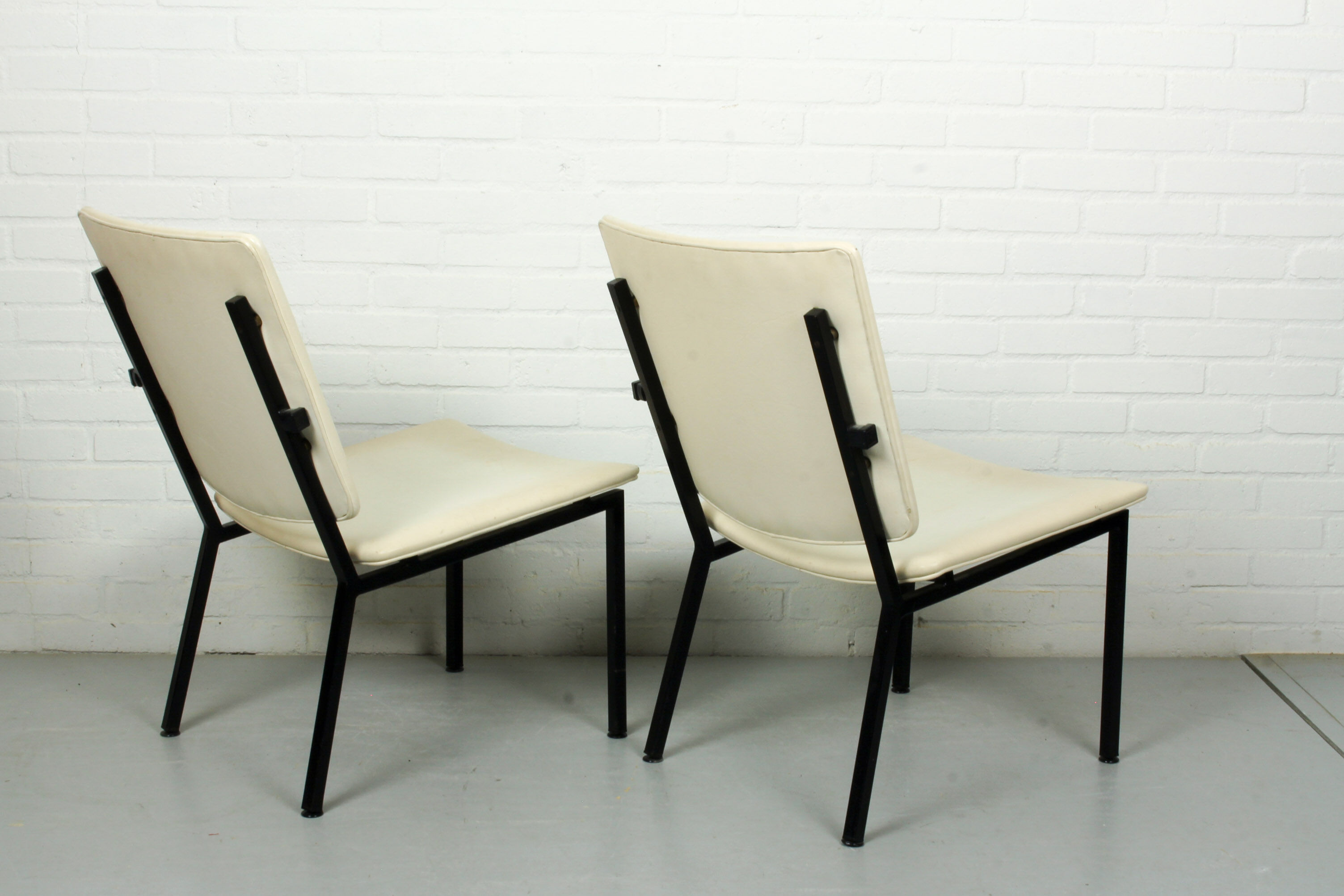 Set of 2 Industrial minimalist black metal tube frame chairs, 1960s