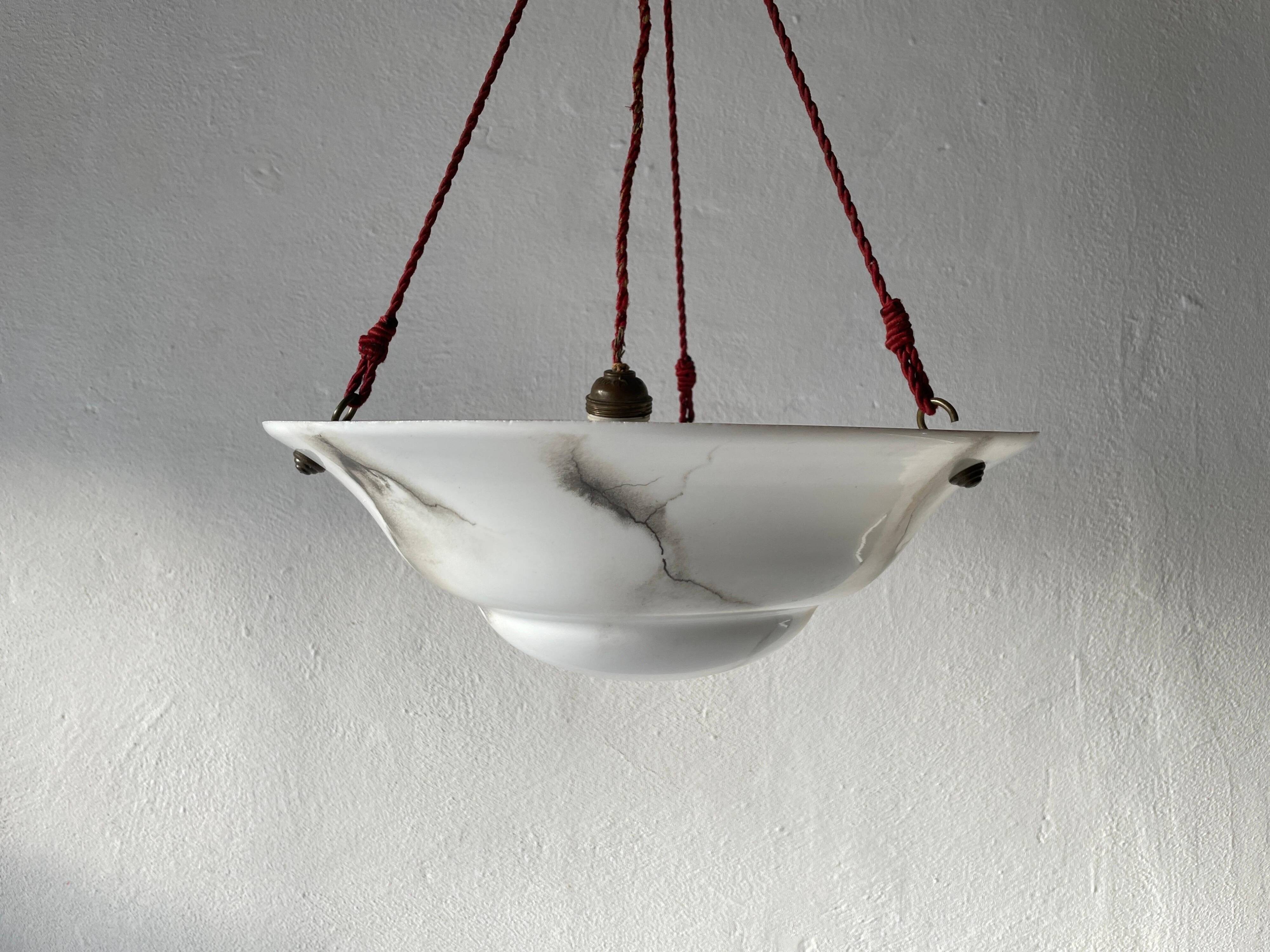 Art Deco suspended lamp in white marble-effect glass, 1940s, Germany.