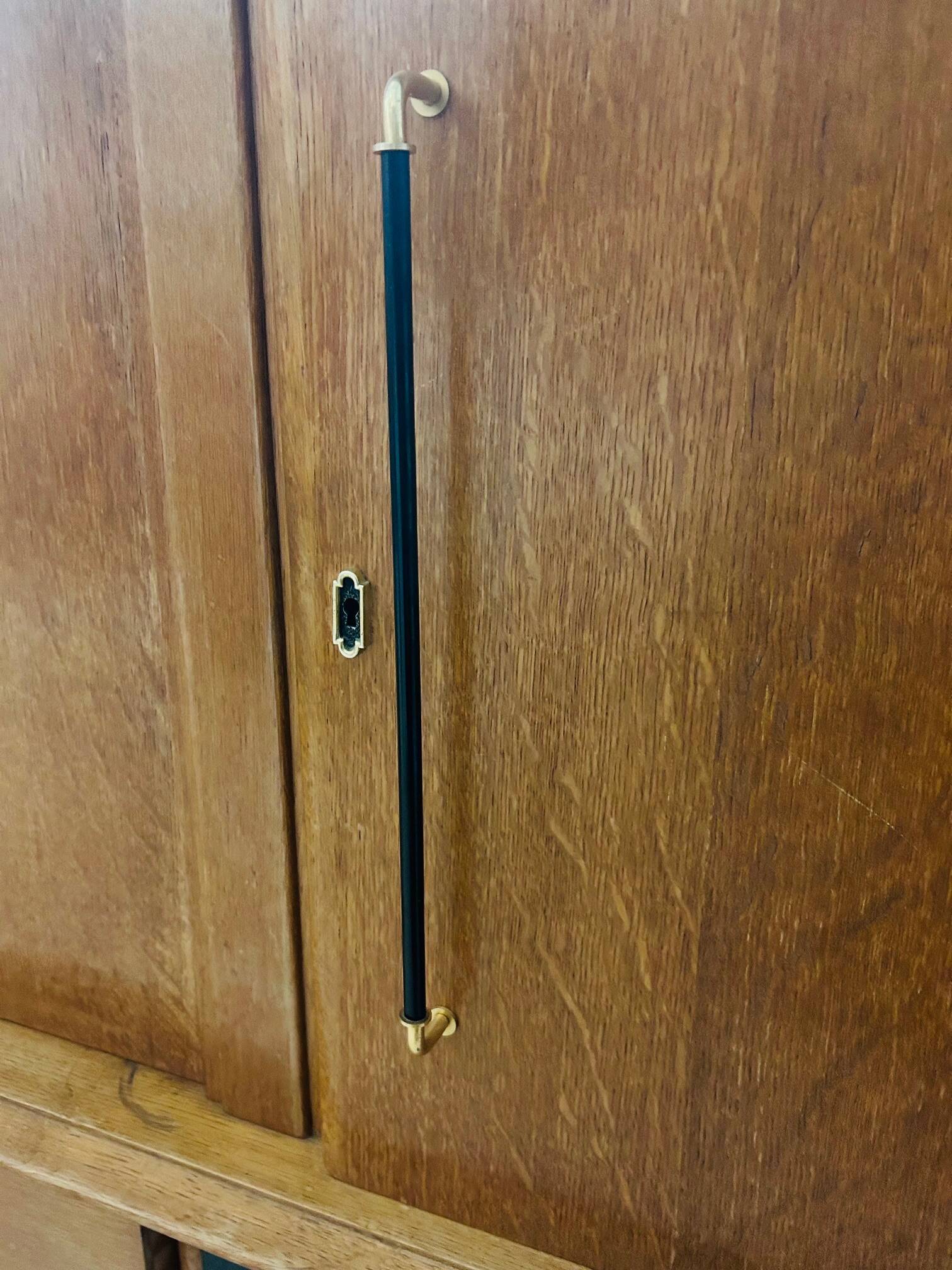 Oak sideboard with compass legs