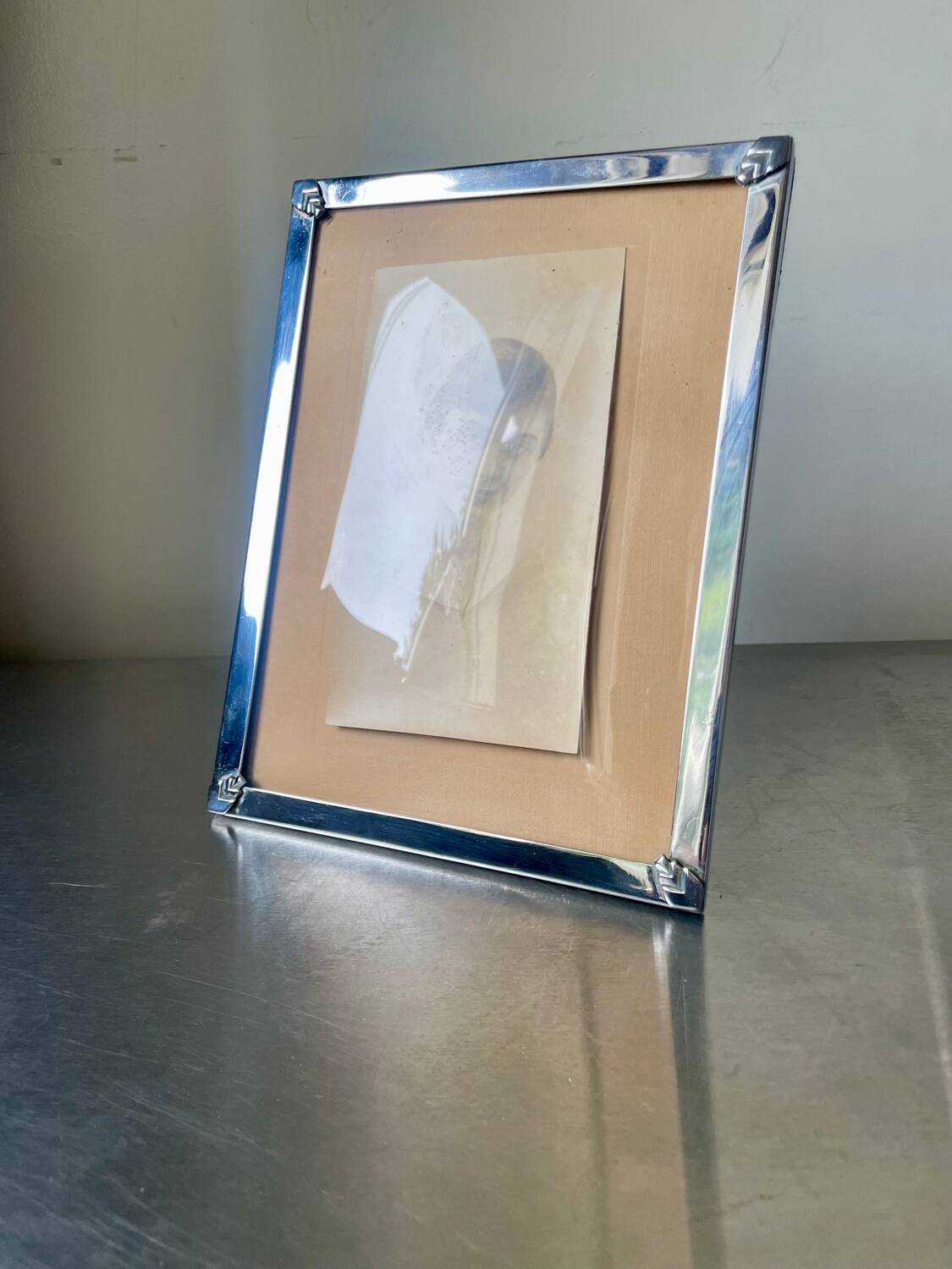 Art deco silver colored  metal frame  20.5  cm x 15.5 cm convex glass