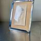 Art deco silver colored  metal frame  20.5  cm x 15.5 cm convex glass