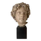 Plaster bust on a wooden base