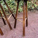 Set of three brutalist tripod stools