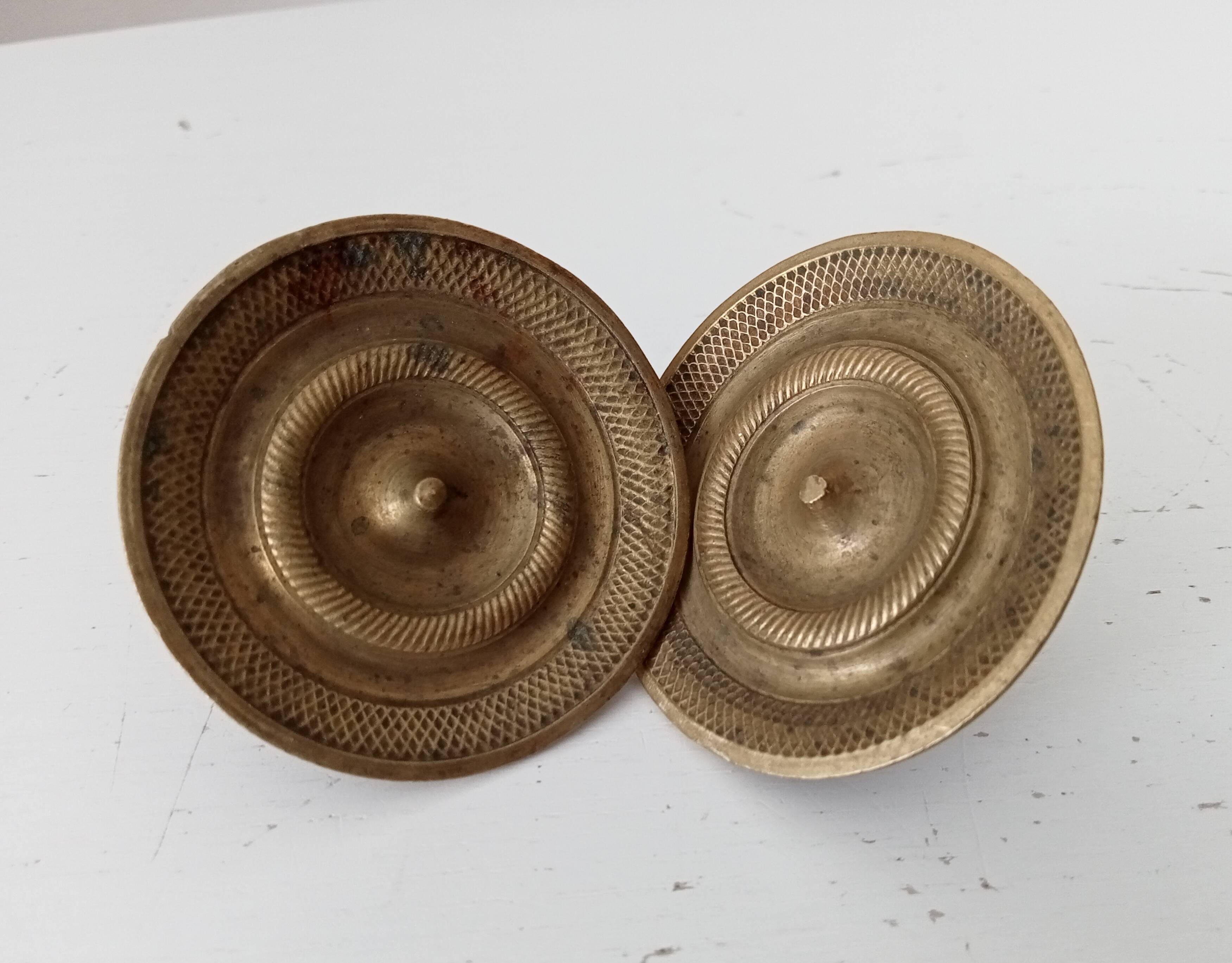 Pair of antique Empire furniture knobs in bronze from the 19th century.