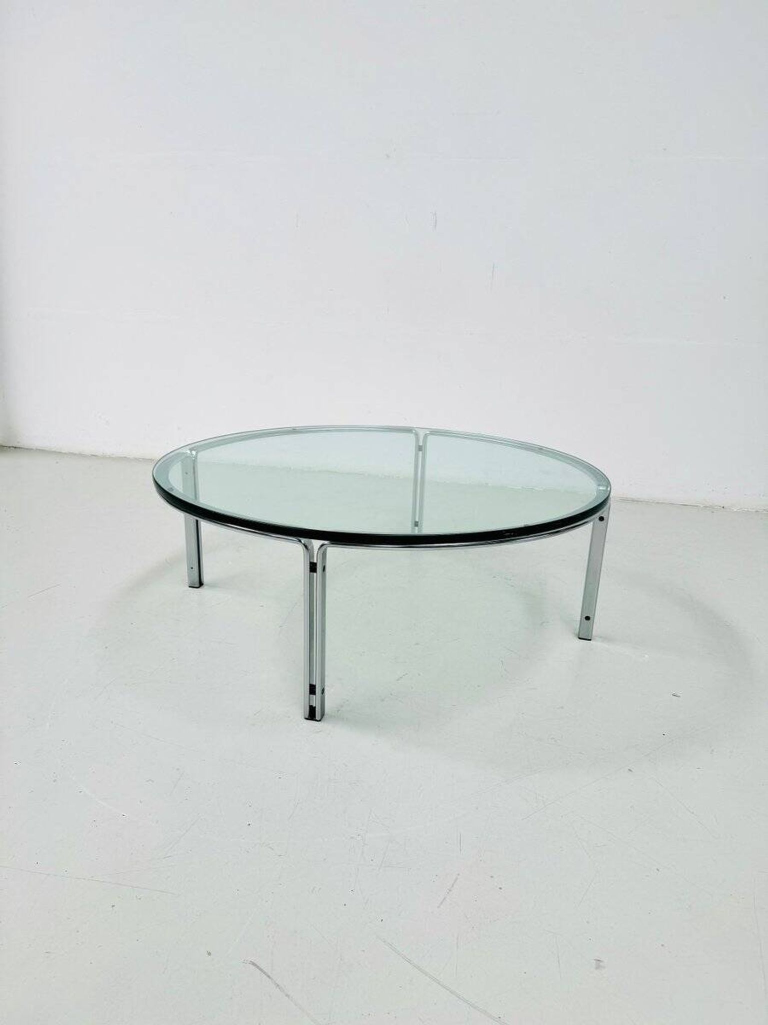 Vintage round glass & steel coffee table by Horst Brüning for Kill International, 1960s