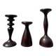 Trio of large turned wooden candlesticks