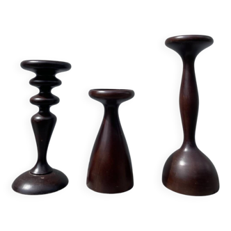 Trio of large turned wooden candlesticks