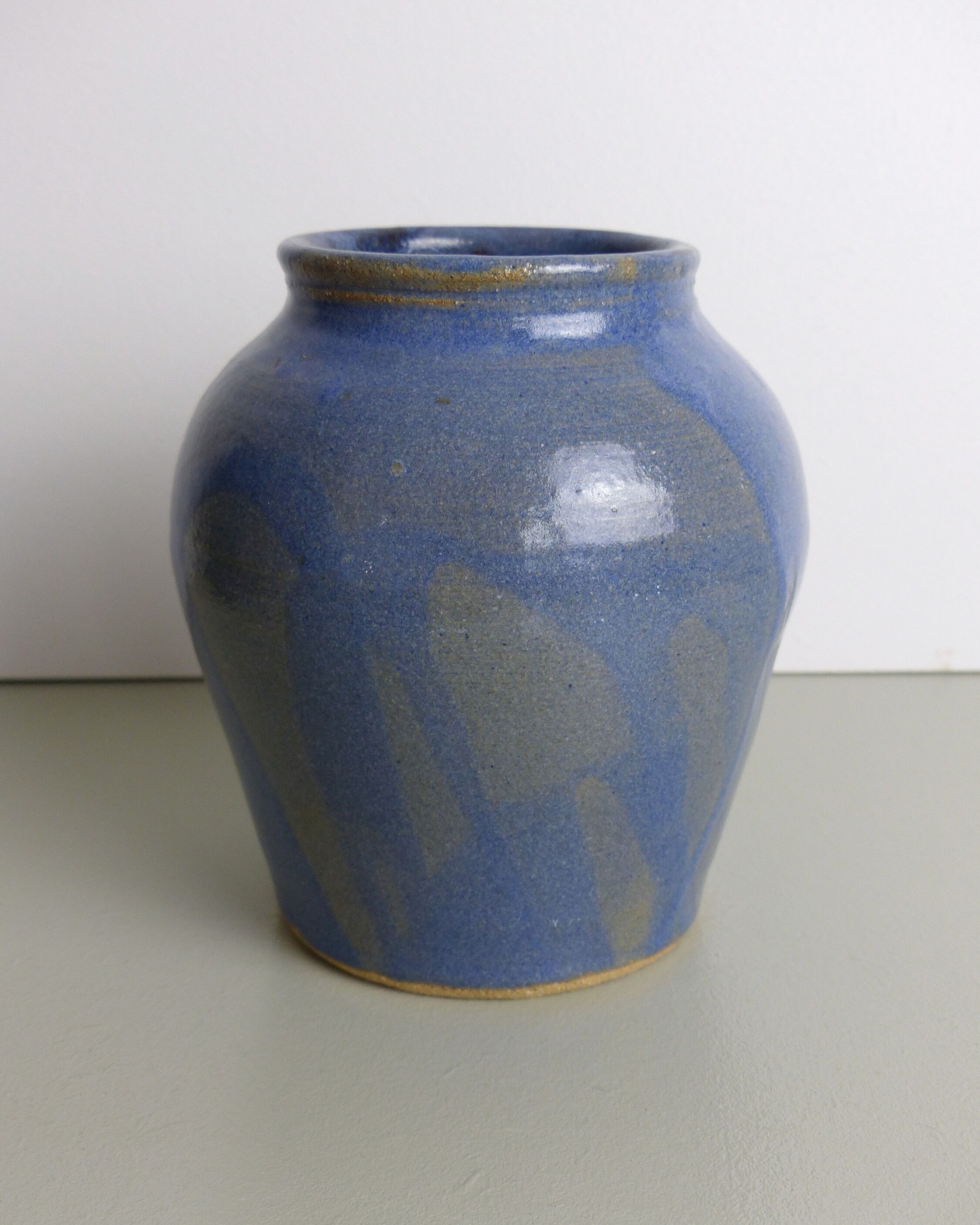Blue and beige ceramic vase signed