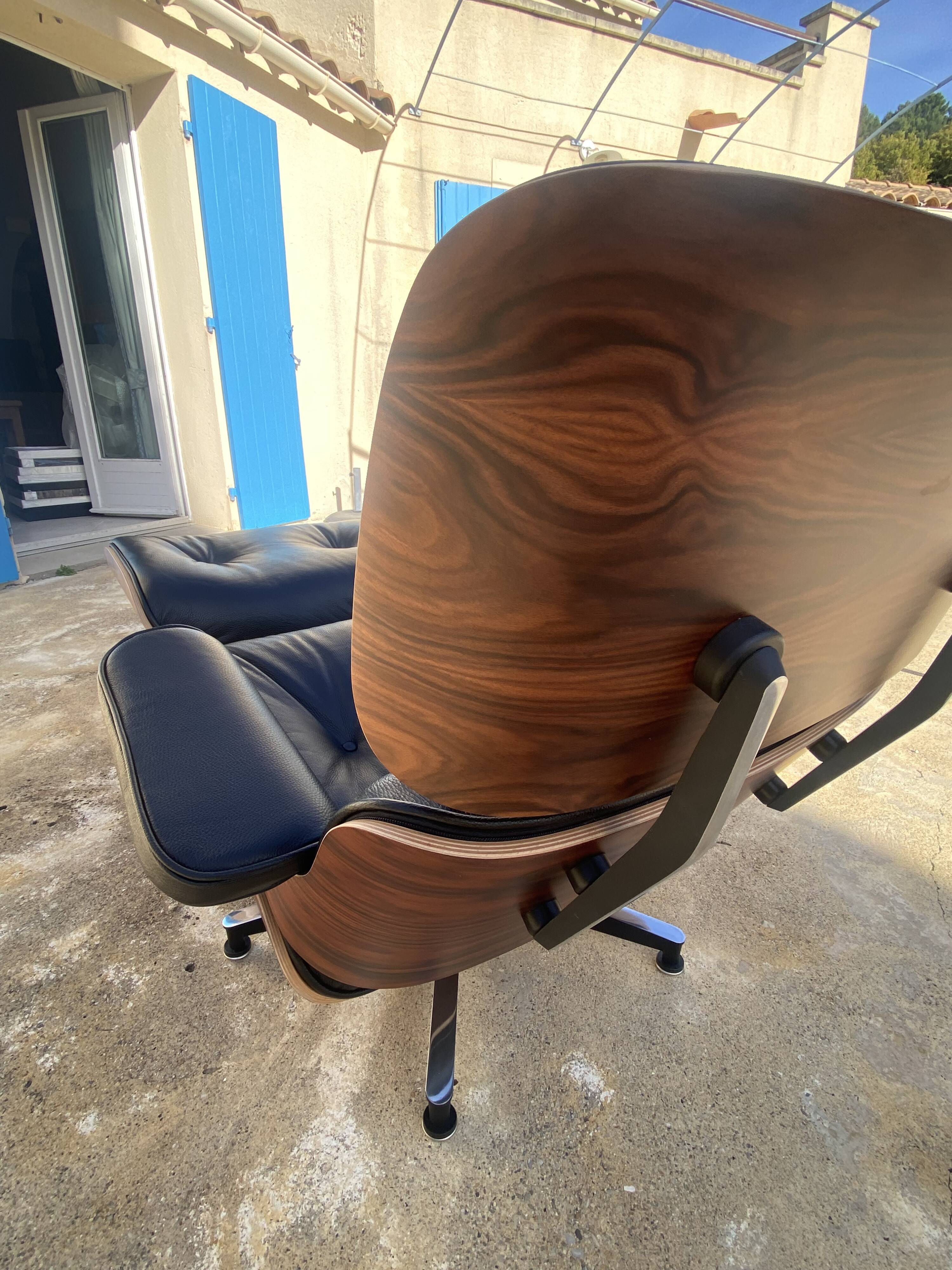 Fauteuil et Ottoman Charles Eames noir, Herman Miller, 2010