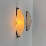 Vintage wall lights, chrome metal and frosted glass, France, 1970.