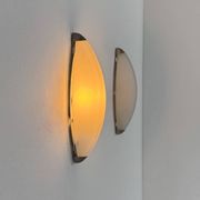 Vintage wall lights, chrome metal and frosted glass, France, 1970.