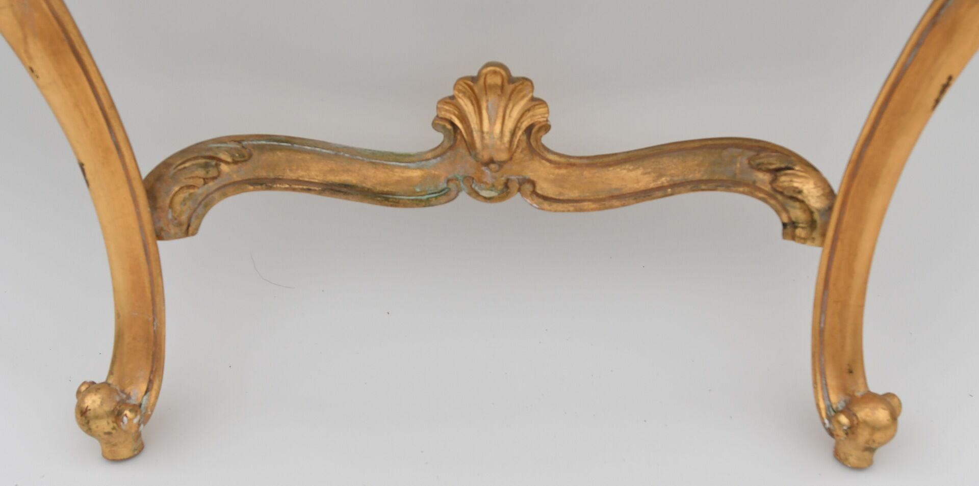 Rocker-style gilded wooden console