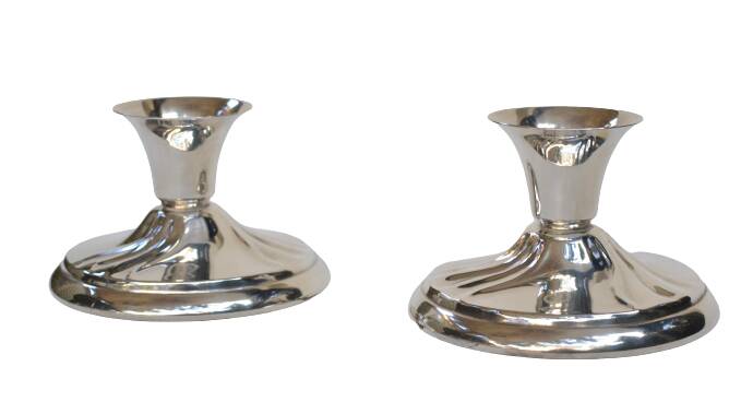 Pair of silver metal candlesticks