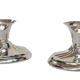 Pair of silver metal candlesticks