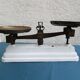 White enamelled cast-iron roberval balance