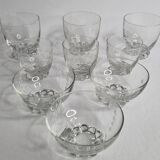 Set of Art Deco style engraved crystal bowls and glasses on spherical feet